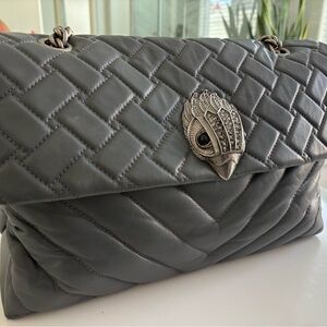 Kurt Geiger Dark Gray with Silver Detail. Some wear on the edges. See pic